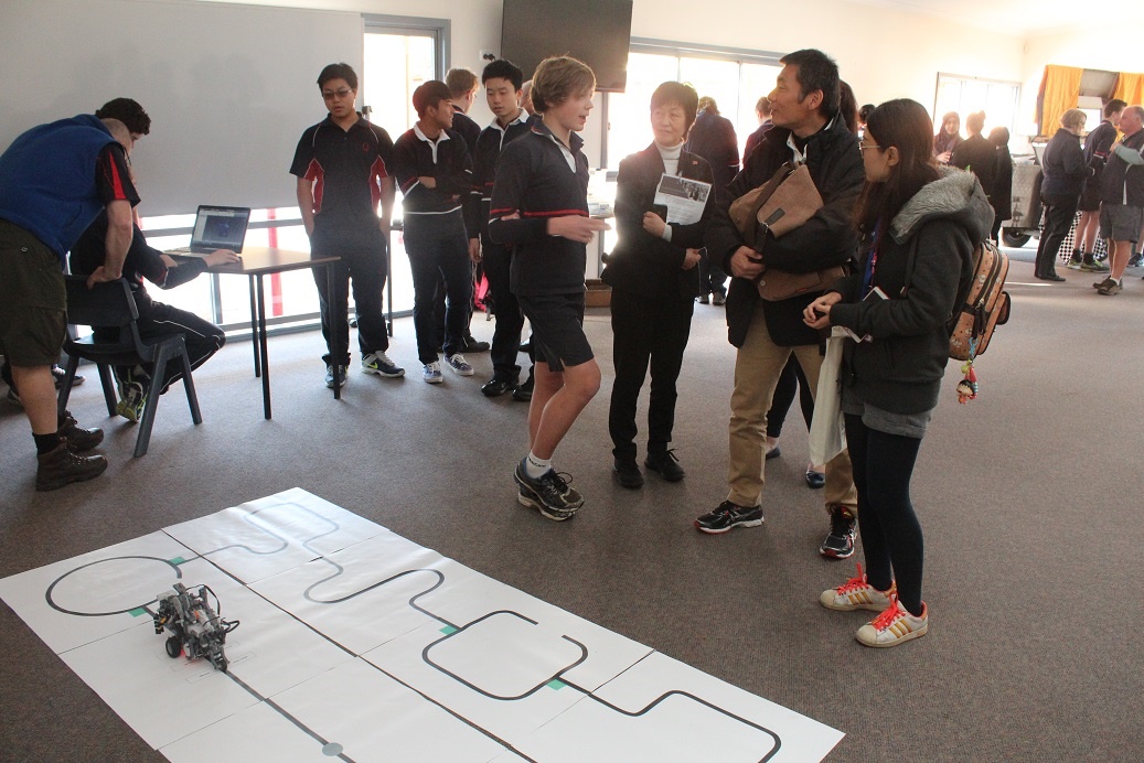 Queechy student with his robotics engineering project